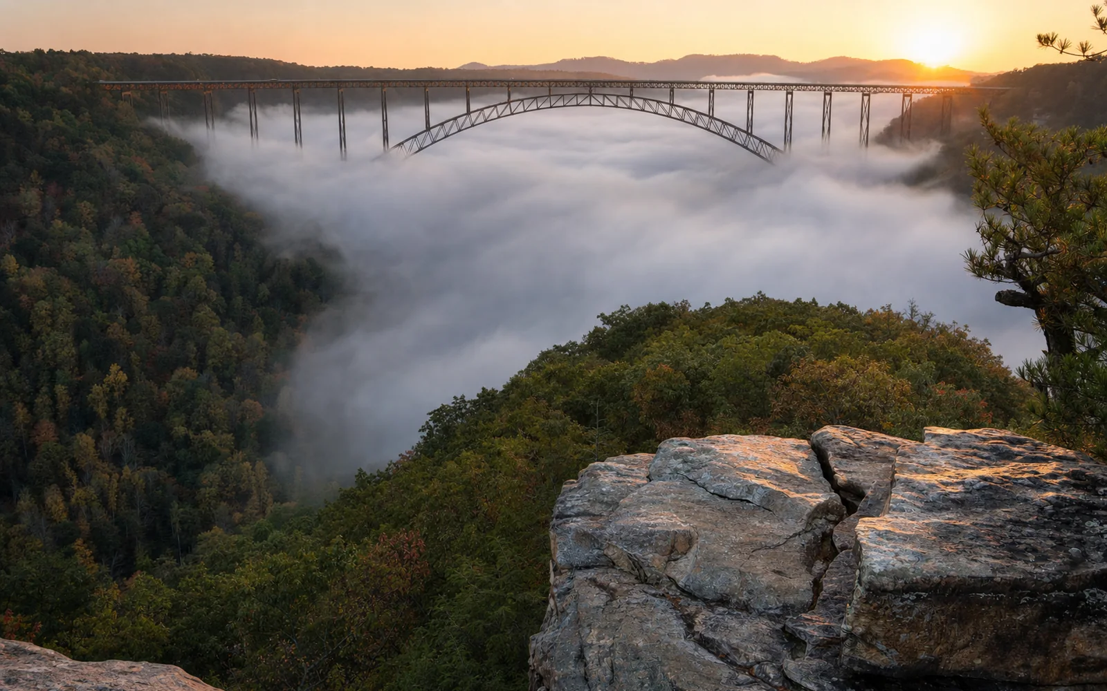Morning fog filling the New River Gorge up to the bridge, the deck and upper arch emerging above a sea of cloud, the far rim in early sun, AI-generated illustration