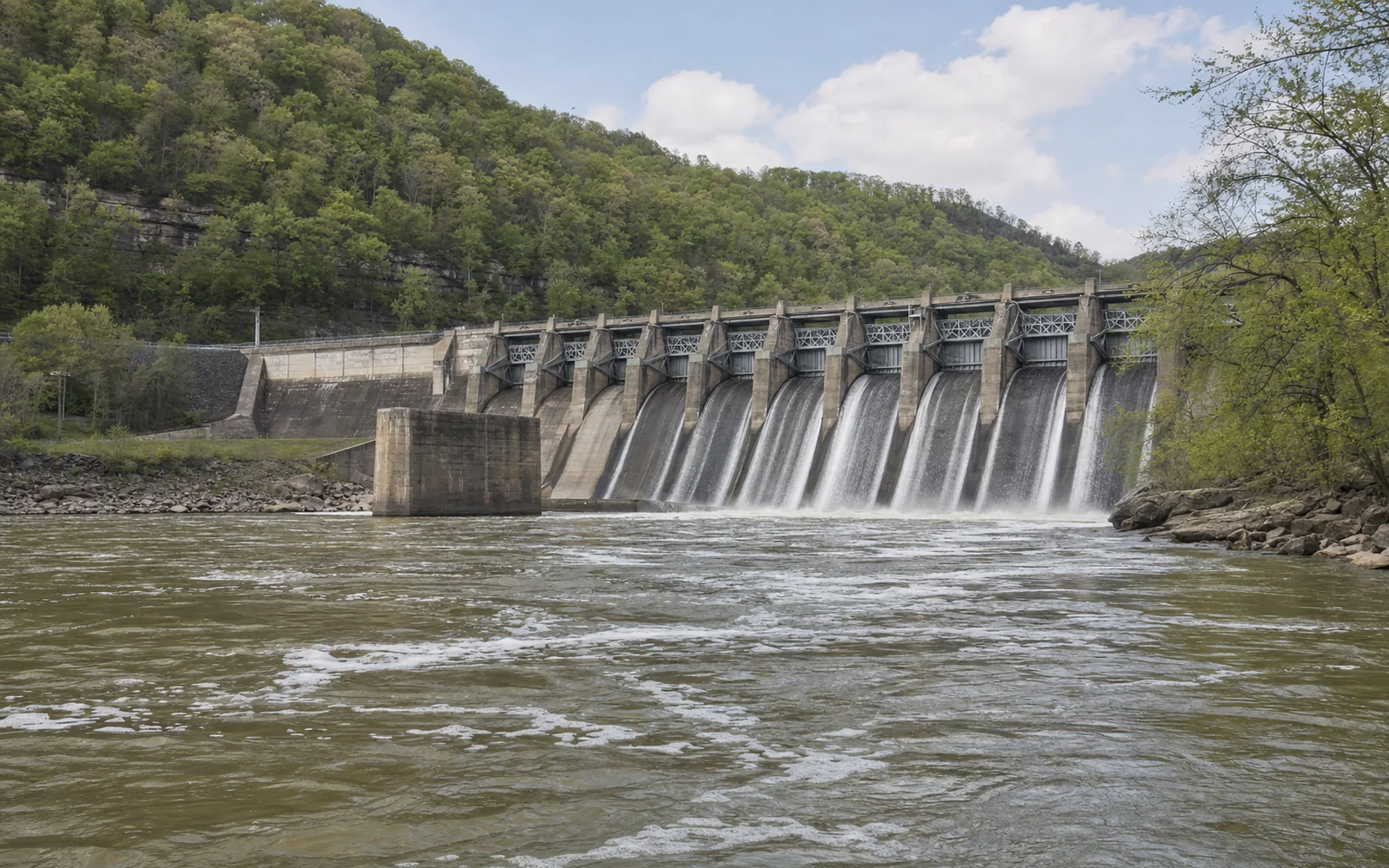 Bluestone Dam, a long concrete gravity dam across the New River with its spillway gates, water spilling below, AI-generated illustration